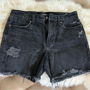 Distressed black denim shorts